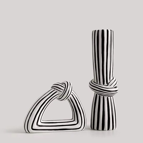 WHITE AND BLACK PAIRED KNOTTED VASE